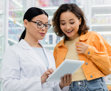 asian-pharmacist-in-glasses-using-digital-tablet-n-2023-10-10-03-55-18-utc-1.jpg
